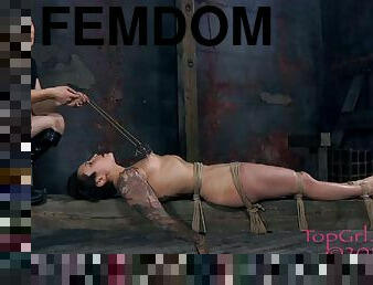 Brunette slave in femdom BDSM shoot getting stripped