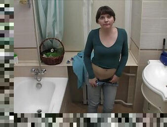 Chick films herself acting nasty in the bathroom