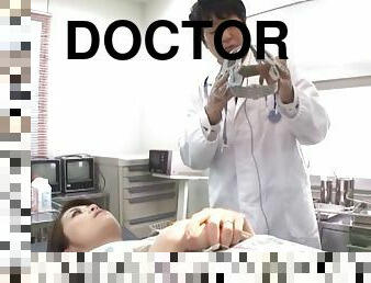 A doctor tests his Asian patient by teasing her tits and toying her pussy