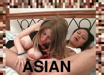 Young Asian goes down on a busty milf