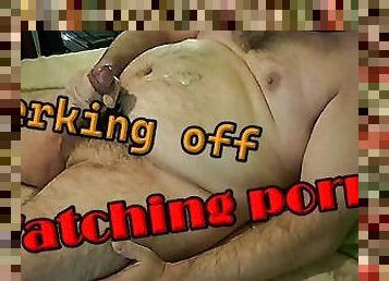 I jerk off watching porn.