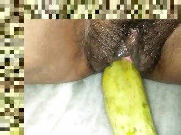 Wife spreading her hairy wet pussy and playing with cucumber
