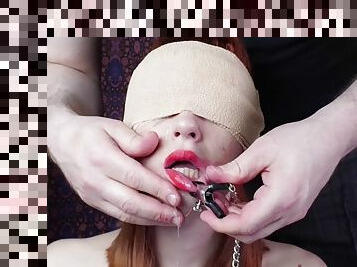 Blindfolded redhead slavegirl gagging cock