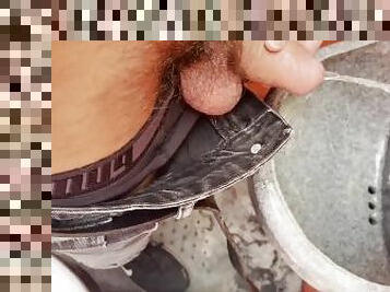 Pissing in the mobile toilet with a big balls