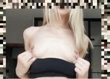 Skinny 18-year-old blonde shows off her small boobs on camera