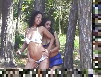 Horny ebony lesbian pussy lickers enjoying a hot forest sex action