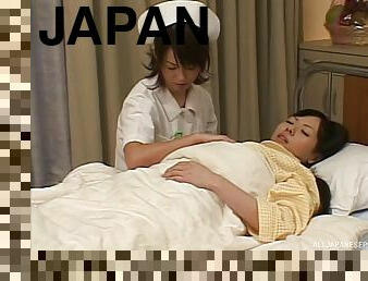 Naughty Japanese nurse seduces her patient into a heated lesbians action