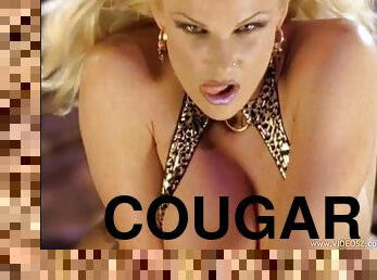 Drop dead sexy cougar Nikki Tyler fucks a lucky guy on stage