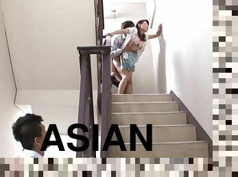 Asian MILF has Clothed Sex in the Middle of a Staircase