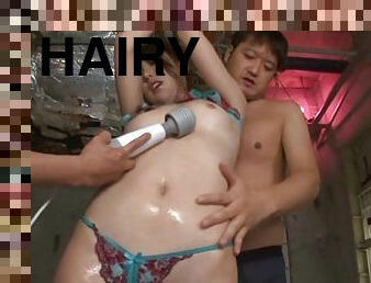 Her hairy pussy gets teased with vibrators in this hot Japanese mmf threesome