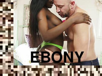 Kay Love is an ebony babe who loves a thick white cock