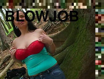 Ambitious chubby with big tits in bra giving massive dick blowjob in the forest