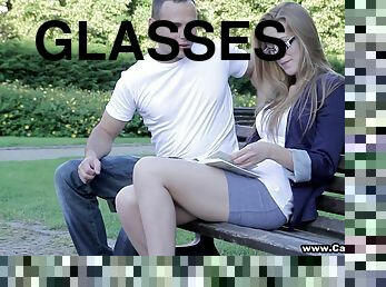 A coed with glasses meets a guy in a park and ends up on his cock