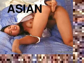 Hot tanned Asian girl dildo insertio