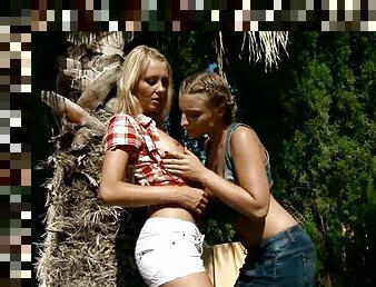 Naughty teens fingering their pussies in the garden