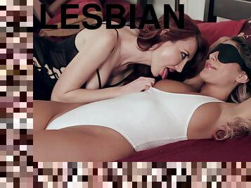 Charming lesbian babes in action with a vibrator