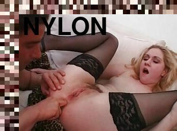 Striking babes in nylon stocking getting her anal fingered and banged hardcore on sofa