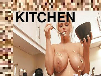 Slutty solo model with big tits undresses in the kitchen