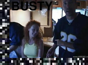 Busty redhead Audrey Hollander enjoying a gangbang