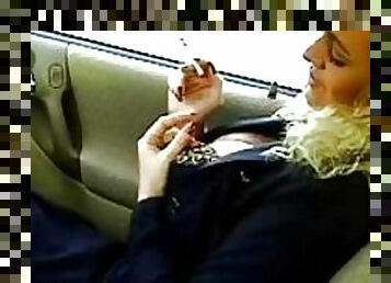 Business babe smoking in the car