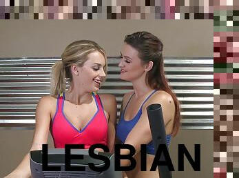 Sporty lesbian babes have a hot threesome in the gym