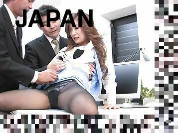 Elegant Japanese chick sucks two boners
