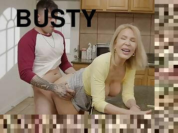 Busty granny gets fucked in the kitchen for her birthday