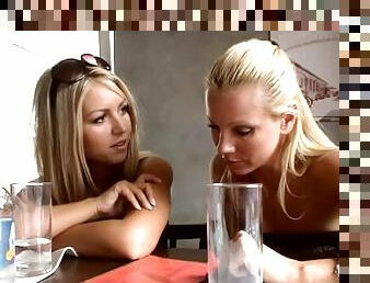 Hot blonde girl goes to the toilet and then talks to her friend