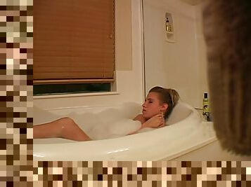 Hidden camera captures girl masturbating in bathtub