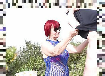 Redhead granny Linda takes off her clothes to ride a pool guy