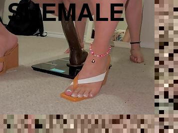 Wearing brown wedges and sliding on a BBC dildo