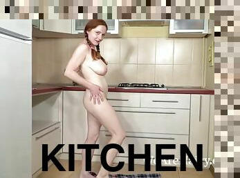 Elouisa strips naked in the kitchen to play naked