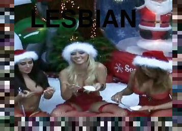 Three girls in red fishnets have lesbian sex at Xmas Eve