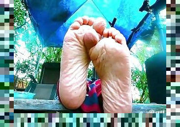Relaxing my wrinkly feet outdoors - Cute pair of soles resting in nature ASMR