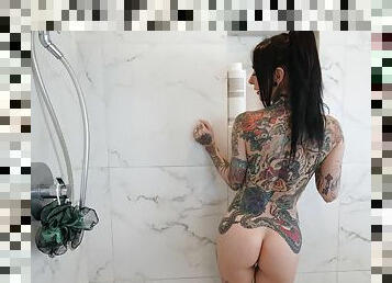 Tattooed whore devours whole cock in shower POV