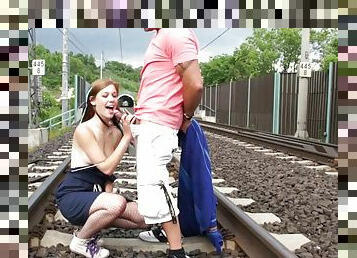 Sex at a railroad station with a teen in fishnets