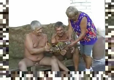 Old guys undress granny chick outdoors