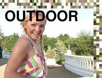 Blonde with pigtails gets cumshot after being slammed in an outdoors scene