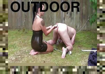 Mistress Stuffs The Slave Outdoors