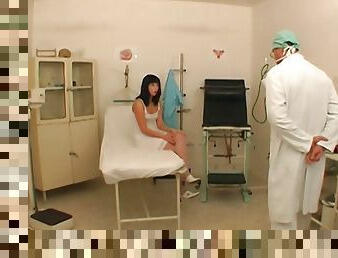 A doctor inspects his patient then puts his cock inside her