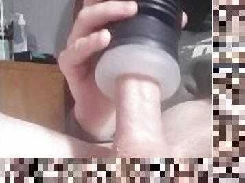 Hung twink plays with his fleshlight leads t massive cumshot