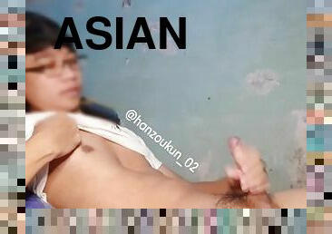 Asian boi plays his cock again