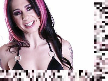 In hot fishnets, Joanna Angel looks great while fucking her toy