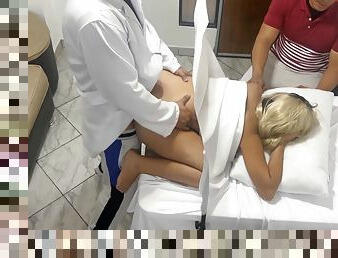 Pervert Poses As A Gynecologist Doctor To Fuck The Beautiful Wife Next To Her Dumb Husband In An Erotic Medical Consultation