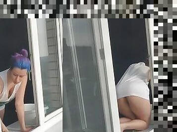 A neighbor girl washes windows without a bra and panties