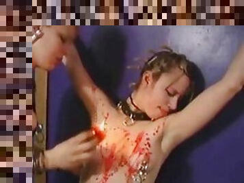 Pain slut is tied up and dripped with hot wax