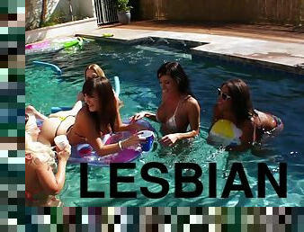 Lesbians in bikini enjoy licking and fucking using a strap on in an outdoors scene