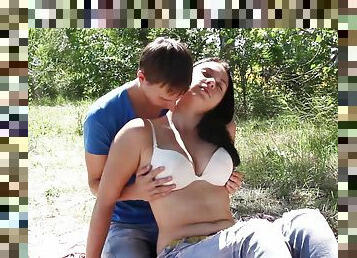 Outdoor cock riding session with an alluring brunette teen girl