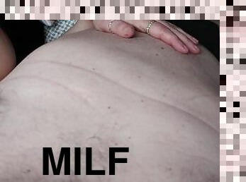 Hand job in bed from MILF mom