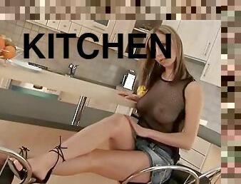 Masturbation scene in the kitchen along a sweet blonde